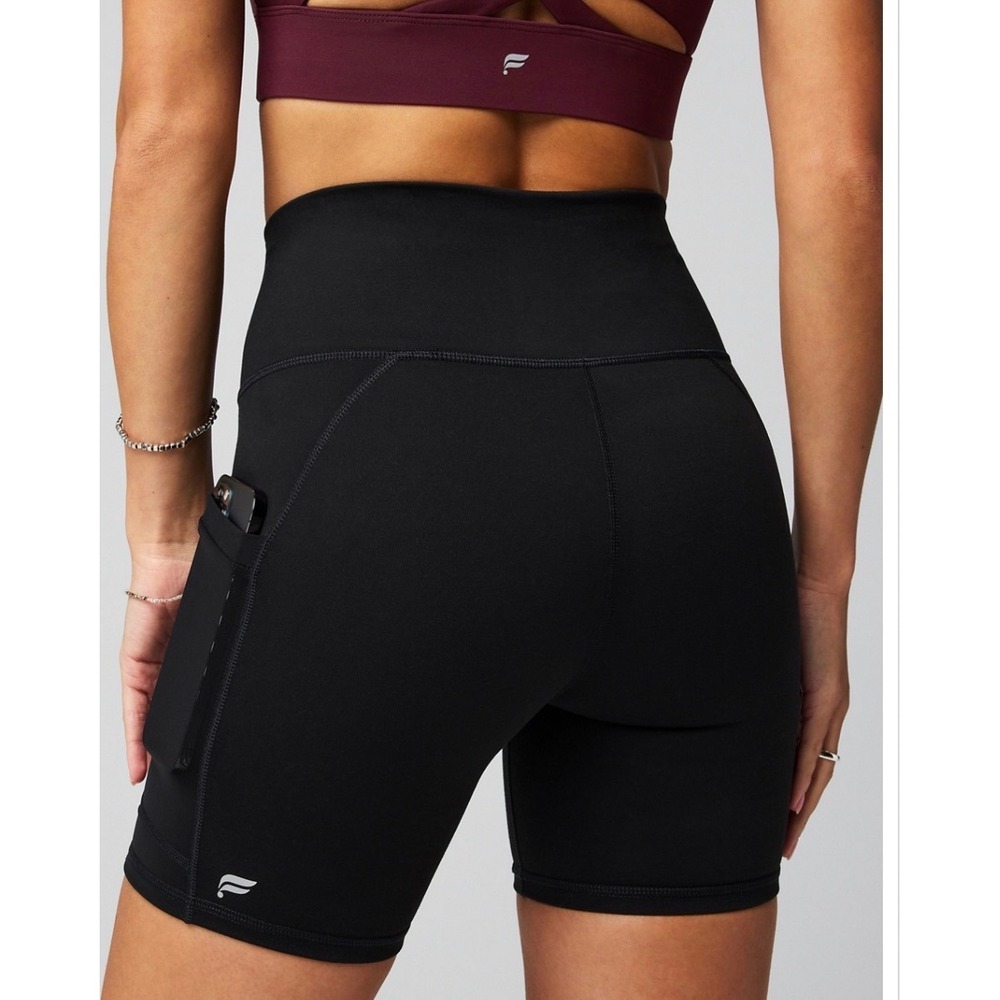 Fabletics PowerHold Black High Waisted Biker Shorts with Pockets Womens